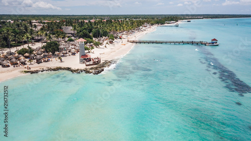 Beautiful Beach at a resort in the Caribbean. View of the beach and the lighthouse. Aerial view