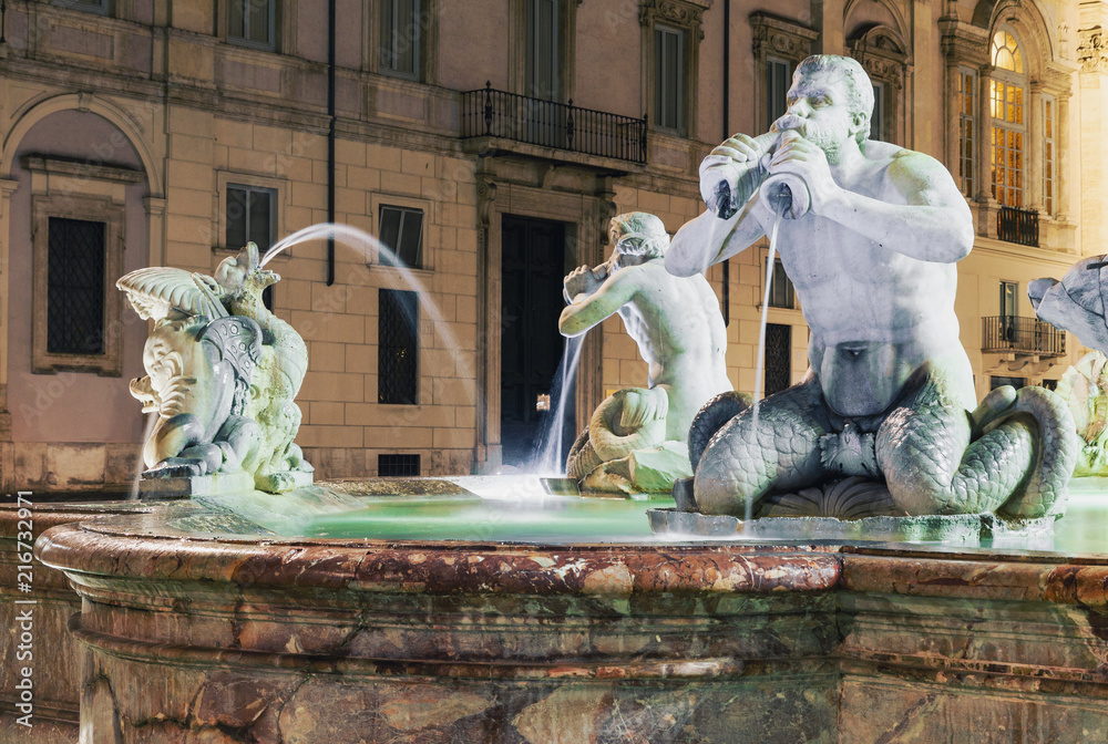 Fontana del Moro fountain in Piazza Navona, Rome, Italy at night 