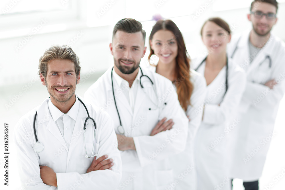 Portrait of medical team standing with arms crossed in hospital Portrait of medical team standing with arms crossed in hospital