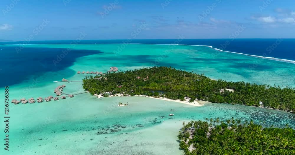 Water bungalows resort at islands, french polynesia in aerial view Water bungalows resort at islands, french polynesia in aerial view