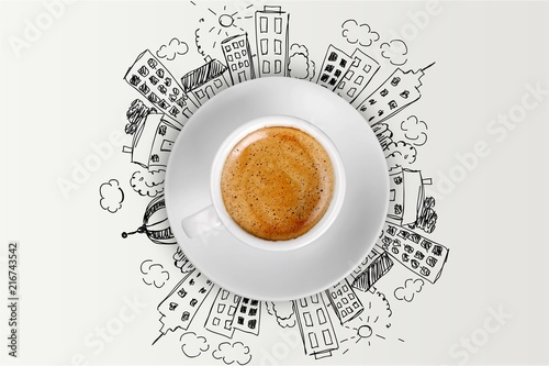 Cup od hot coffe on city background