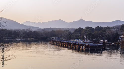 Boats at the Dock at Dusk near the West Lake in Hangzhou, China © Mark Zhu