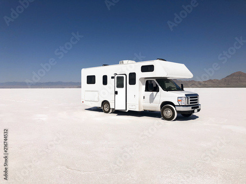Motorhome (RV)  on Bonneville Salt Flats in Utah near the Utah-Nevada border.
