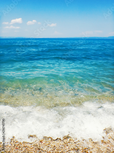 Soft wave of blue ocean on sandy beach Background