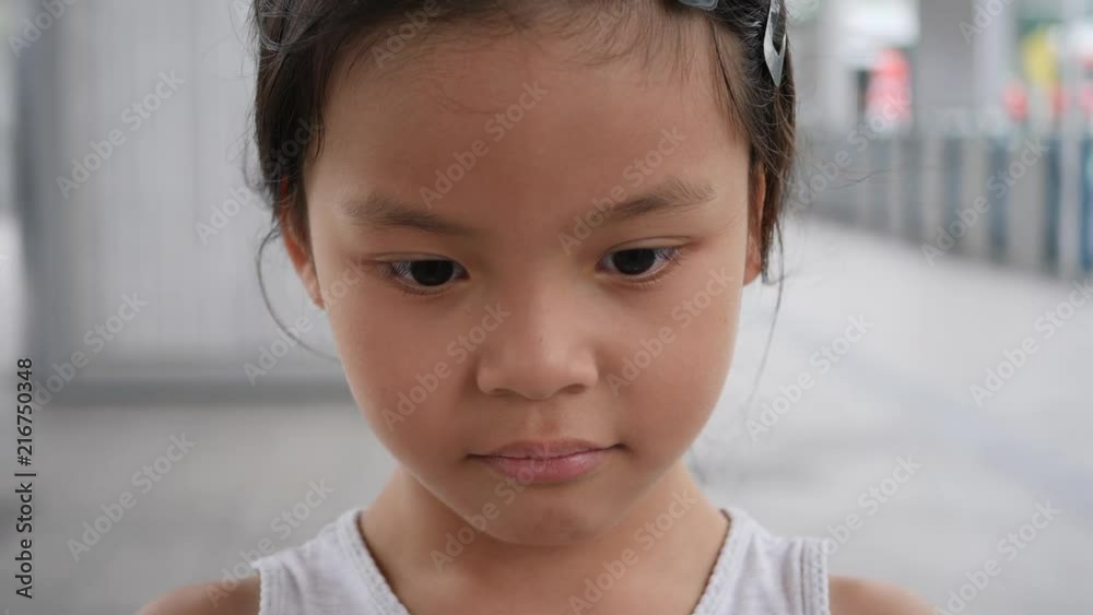 Close up portrait little girl laughing after hearing joke story