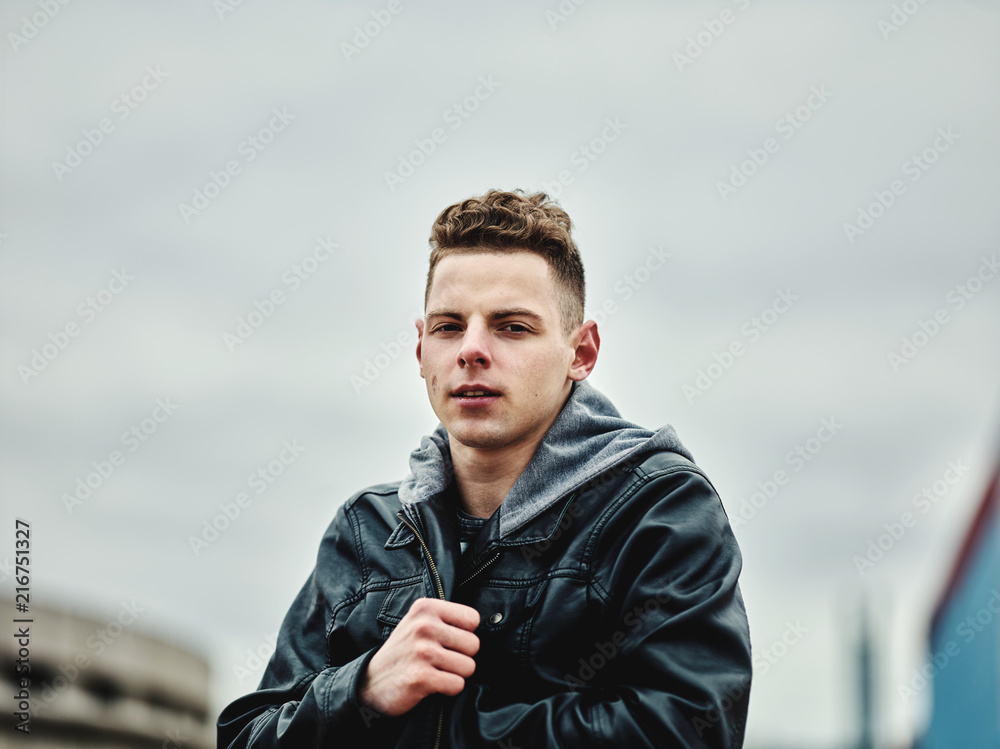 Man in leather jacket looking at camera Man in leather jacket looking at camera