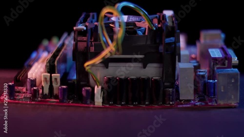 Close up view of an old pentium motherboard. The depth of field is short and has some rack focusing. The lighting is high contrast and still has room for color correction.