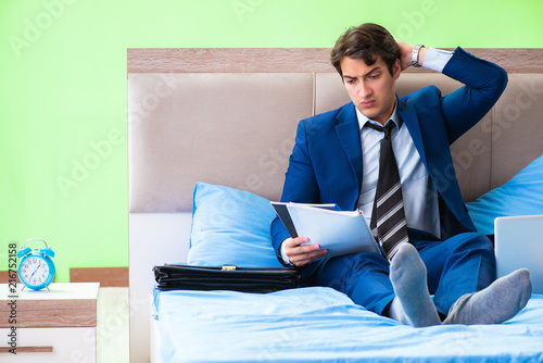 Businessman working in the hotel room