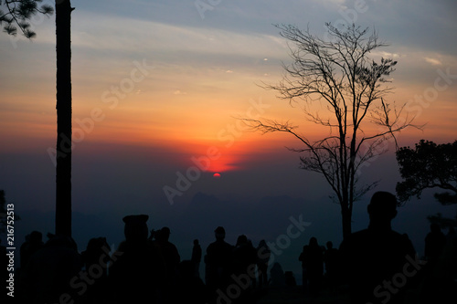 silhouette People seeing sunrise on top of mountain