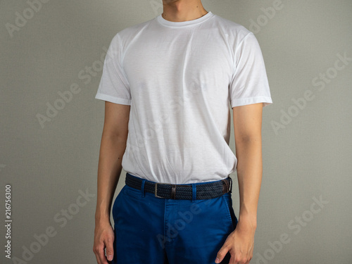 Tucked white t-shirt in the pant