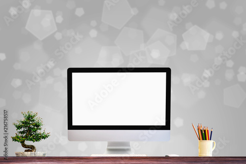 Comfortable workplace with modern desktop computer. Blank screen for graphic display montage.