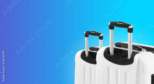Colorful horizontal banner with two suitcases and copyspace. Travelling concept.