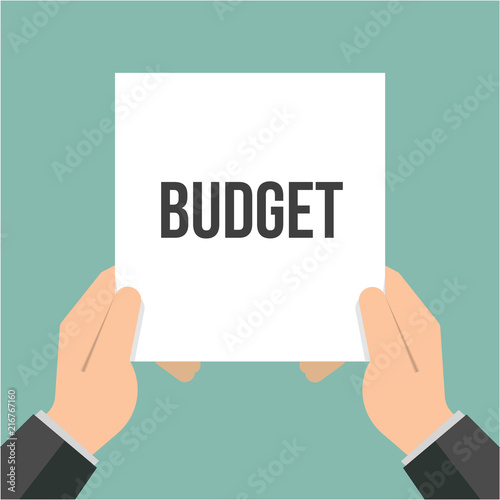 Man showing paper BUDGET text