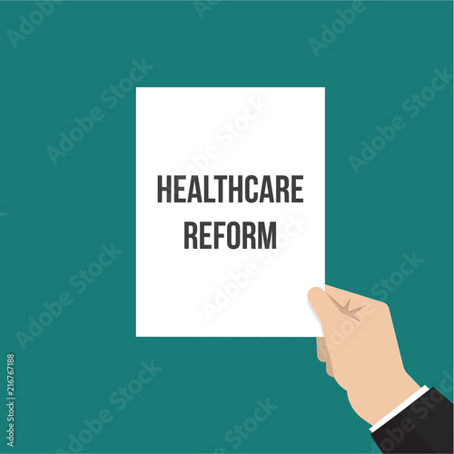 Man showing paper HEALTHCARE REFORM text