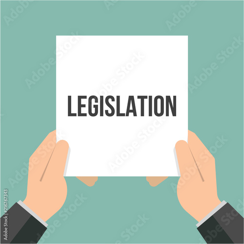 Man showing paper LEGISLATION text