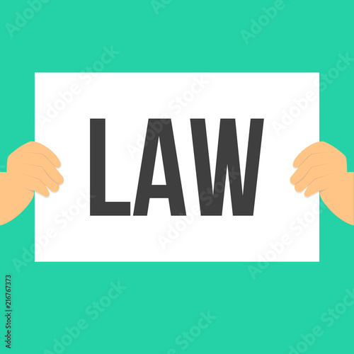 Man showing paper LAW text