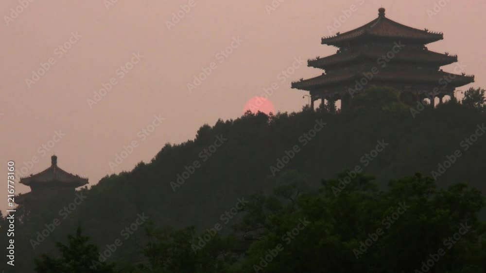 Timelapse of sunset with temples in Beijing China