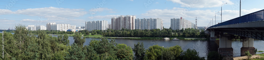 MOSCOW, RUSSIA - CIRCA JULY 2018 Apartment buildings, Moscow river and bridge in Brateevo district