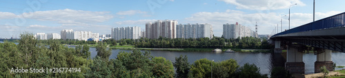 MOSCOW, RUSSIA - CIRCA JULY 2018 Apartment buildings, Moscow river and bridge in Brateevo district