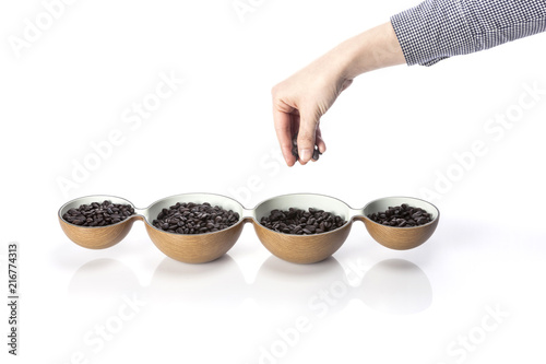coffee bean with a container isolated white.