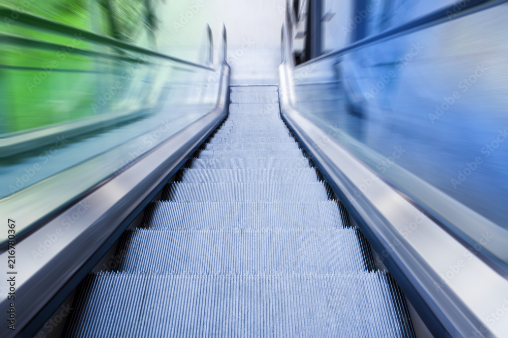 modern escalators, abstract motion blur effect modern escalators, abstract motion blur effect