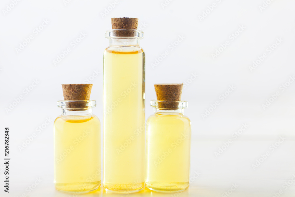 essential oil in beautiful bottle on table essential oil in beautiful bottle on table