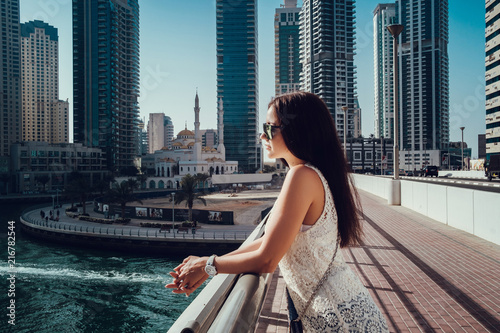 Photography Happy beautiful unrecognizable tourist woman in fashionable summer white dress