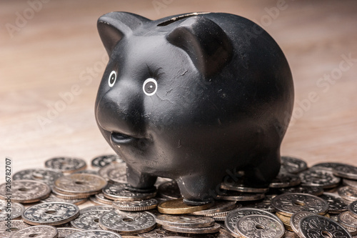 Photography Black Piggy Bank Sat On Pile Of Danish Coins