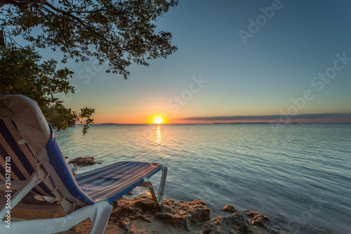 Sunset in Key Largo with chair photo