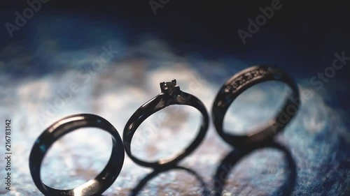 Wedding rings rotating from right to left. photo
