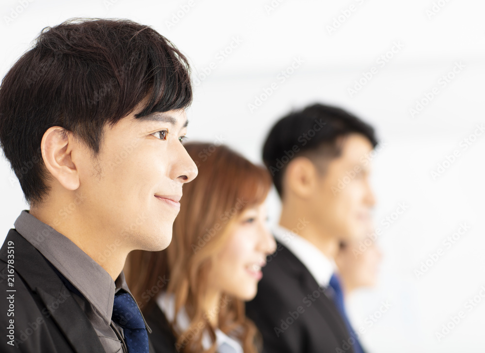 Portrait of young business team in office Portrait of young business team in office
