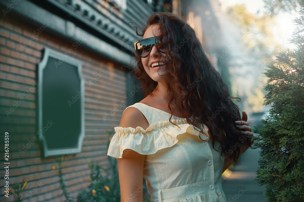 Feminine woman portrait of young pretty trendy girl posing in th Feminine woman portrait of young pretty trendy girl posing in th