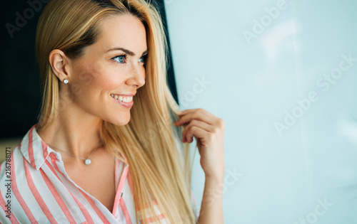 Woman portrait with perfect hair and make-up blonde