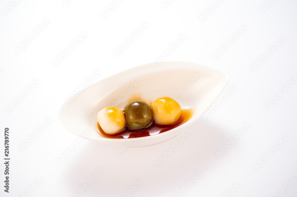 Japanese Dango dessert with 3 different color in pink(red), white, and green, recipe, hanami Dango, tsukimi Dango, copy space. Japanese Dango dessert with 3 different color in pink(red), white, and green, recipe, hanami Dango, tsukimi Dango, copy space.