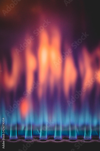 Close-up of colorful gas flame burning