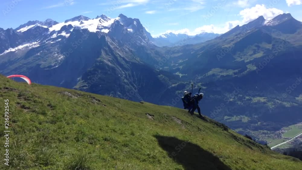 Tandem Paragliding start at Meiringen near Eiger Mönch Jungfrau Tandem Paragliding start at Meiringen near Eiger Mönch Jungfrau
