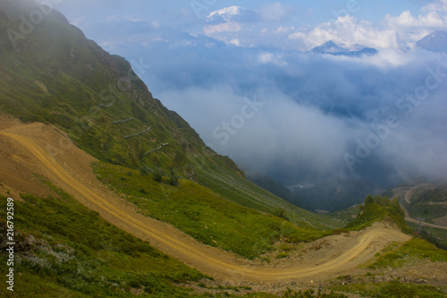 Mountain road high in clouds in the mountains of Sochi, Russia, August 22, 2017