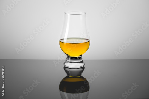 Taster Glass with a Dram of Scotch Whisky photo