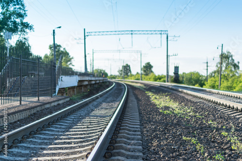 Railway rails leaving into the distance.