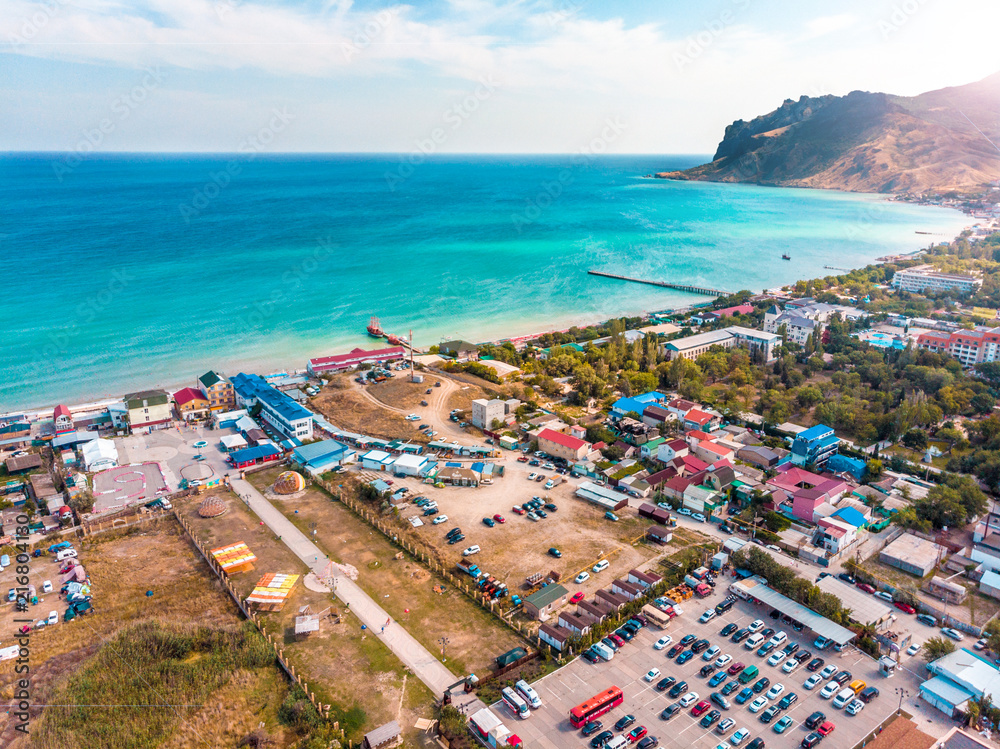Aerial view of a resort town on the seashore. Aerial view of a resort town on the seashore.