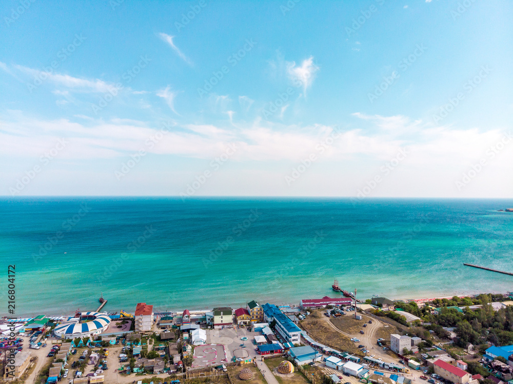 Fototapeta premium Aerial view of a resort town on the seashore.