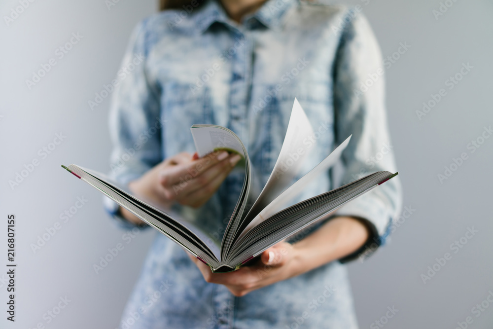Fototapeta premium Girl with a book