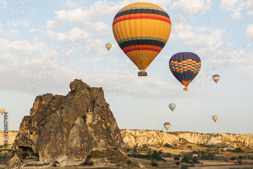 Interesting rocky terrain and a lot of airy multicolored balls in the air. Turkey. Cappadocia. Goreme National Park. 