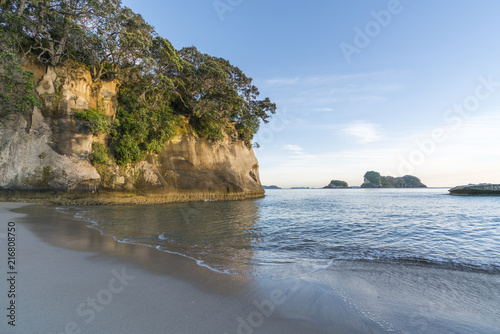 Cathedral Cove beach with Poikeke and Motueka islands in the background. Hahei, Waikato region, North Island, New Zealand. photo