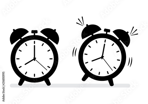 Black and white alarm clock icons. Vector illustration