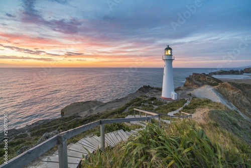 Castlepoint lighthouse at dawn. Castlepoint, Wairarapa region, North Island, New Zealand. photo
