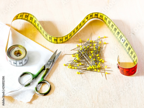 Konstfotografi Sewing centimeter, scissors, pins, fabric