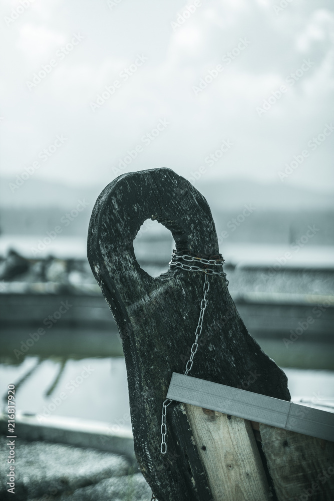 Fototapeta premium Macro of a old wooden boat cleat
