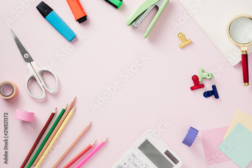 Modern mock up flat lay of notebook and stationery on pink background - Concept of creative work space
