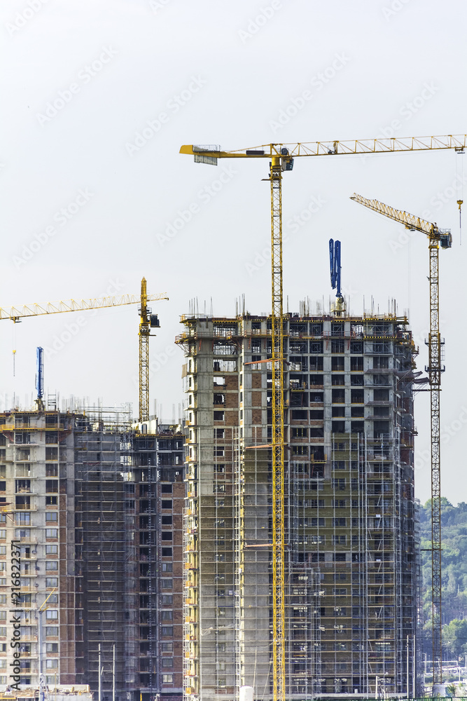 Skyscrapers Building Construction with Cranes. Skyscrapers Building Construction with Cranes.